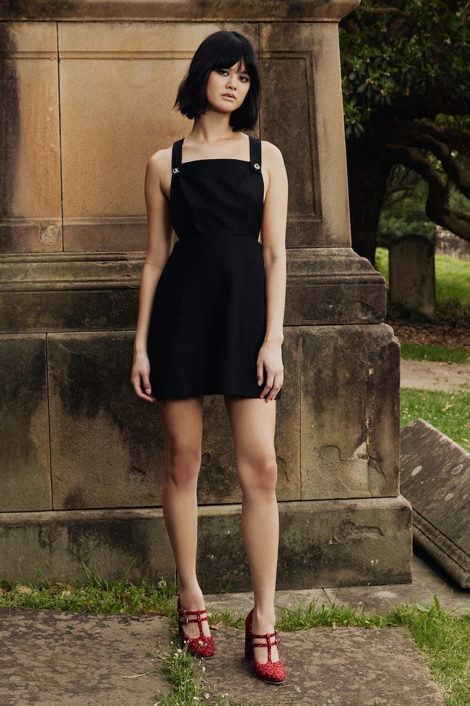 Cross Back Apron Dress in Black